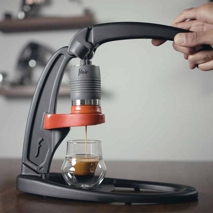 Flair Classic manual espresso maker brew espresso with the red flow control portafilter.