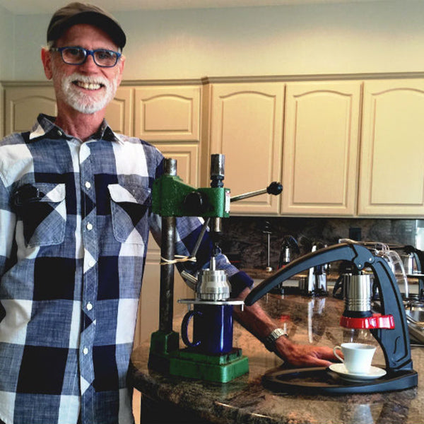 Sergio Landau, the founder of Flair, in a kitchen with one of the original Flair Espresso Maker prototypes.